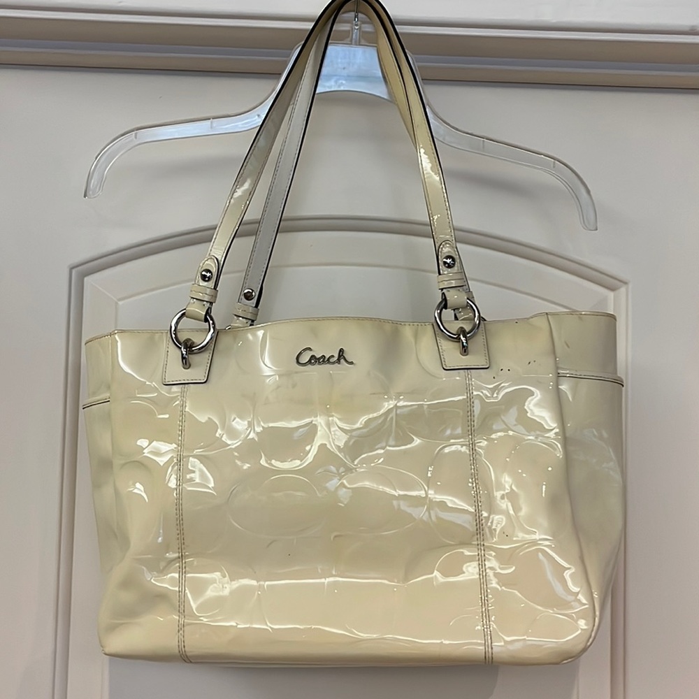 COACH CREAM COLORED